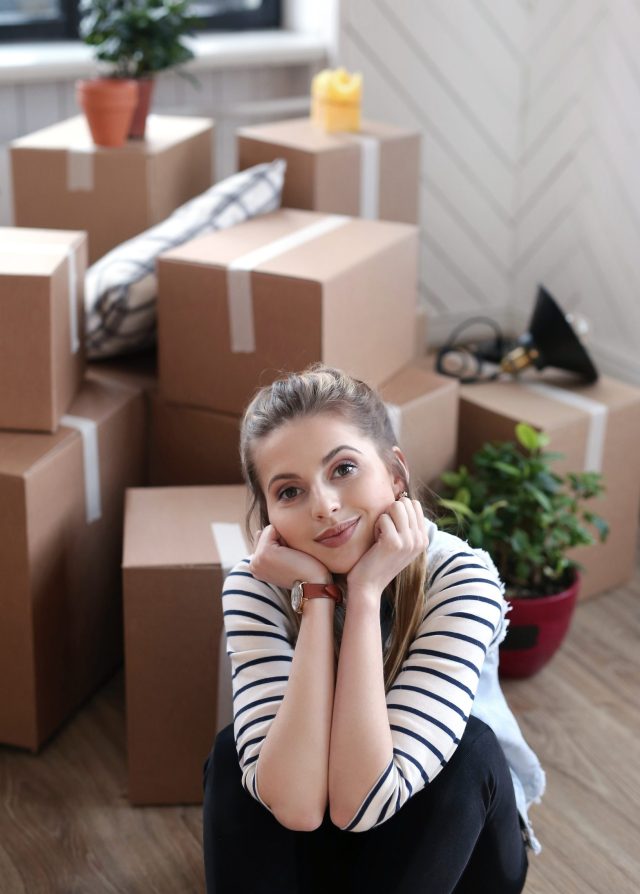 https://houseinvestorsgroup.com/wp-content/uploads/2024/08/woman-finished-with-cargo-packages-is-sitting-boxes-floor-scaled-e1723934102259-640x894.jpg